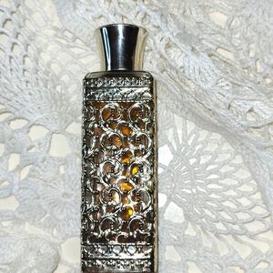 TIFFANY DECORATIVE FILIGREE BOTTLE OF PREFUME. BOTTLE IS ALMOST FULL. 2oz.